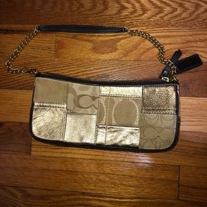 Gold coach purse